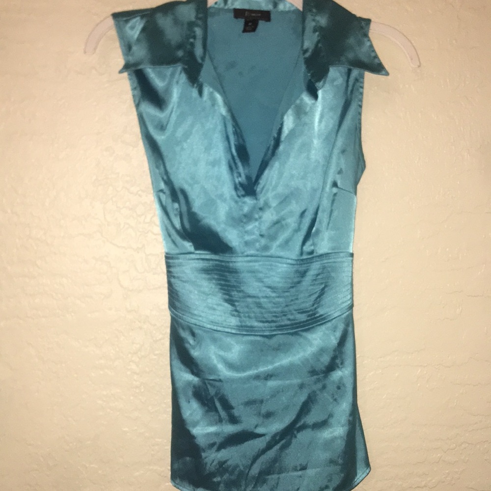Baby blue sleeveless blouse